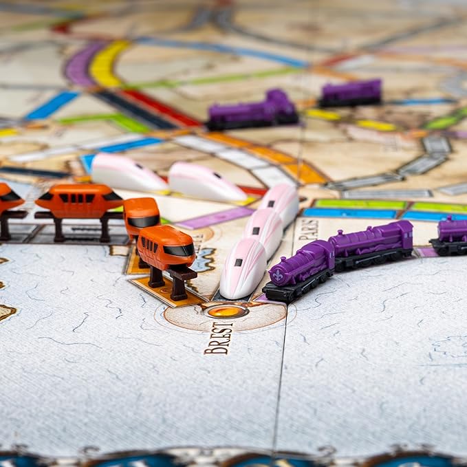 Extraordinary Engines - Deluxe Board Game Train Set | Upgraded Player Pieces for Ticket to Ride and Other Adult, Family, and Kids Train Board Games | Orange, Purple, and White / Pink Colors