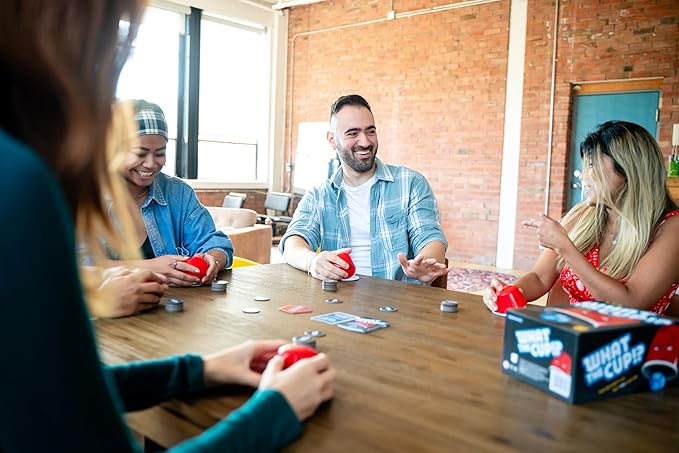 USAOPOLY What The Cup!? | Social Bluffing Dice Game | Featuring Handheld Dice Cups & D12 Dice | Spy, Swap, Steal The Winning Cup | 3-6 Players, Ages 12+